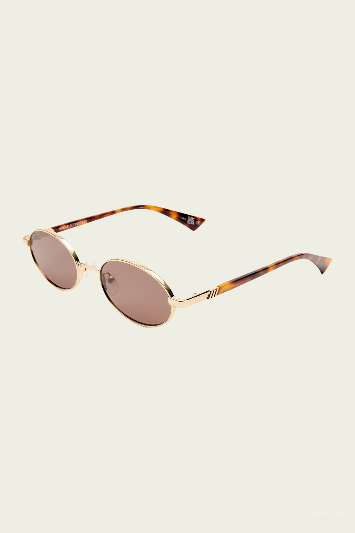 Icicle Oval Sunglasses in Bright Gold - shop - olivia.com