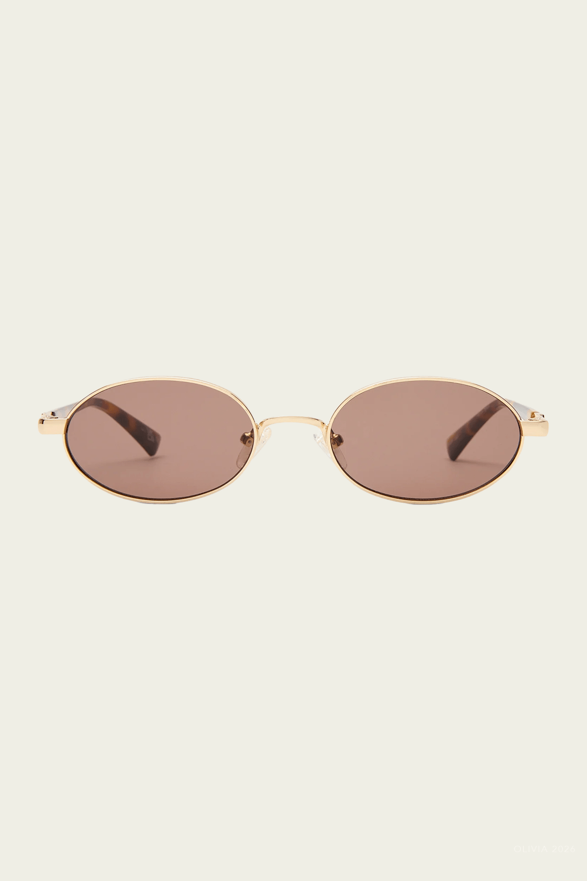 Icicle Oval Sunglasses in Bright Gold - shop - olivia.com