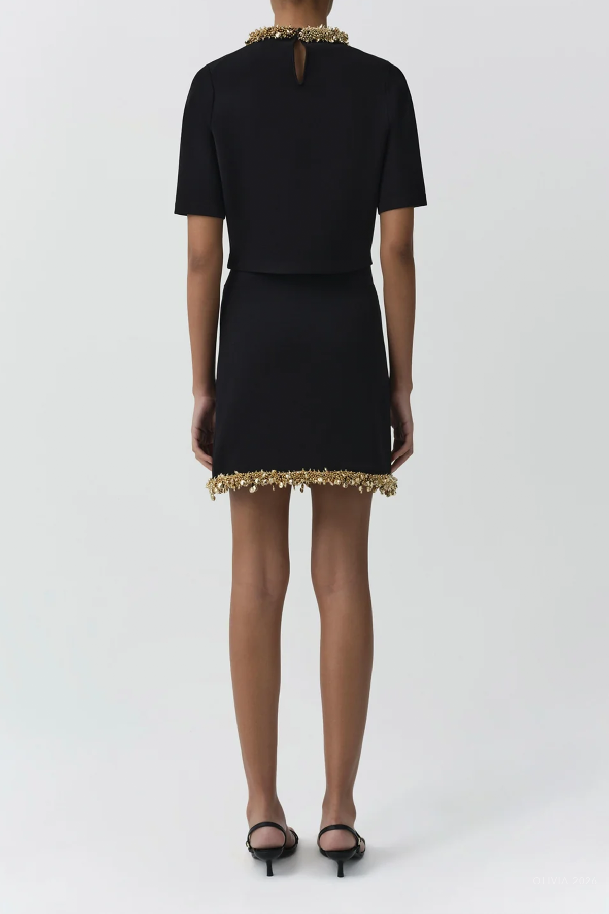 Wendy Compact Knit Mini Skirt in Black Gold
