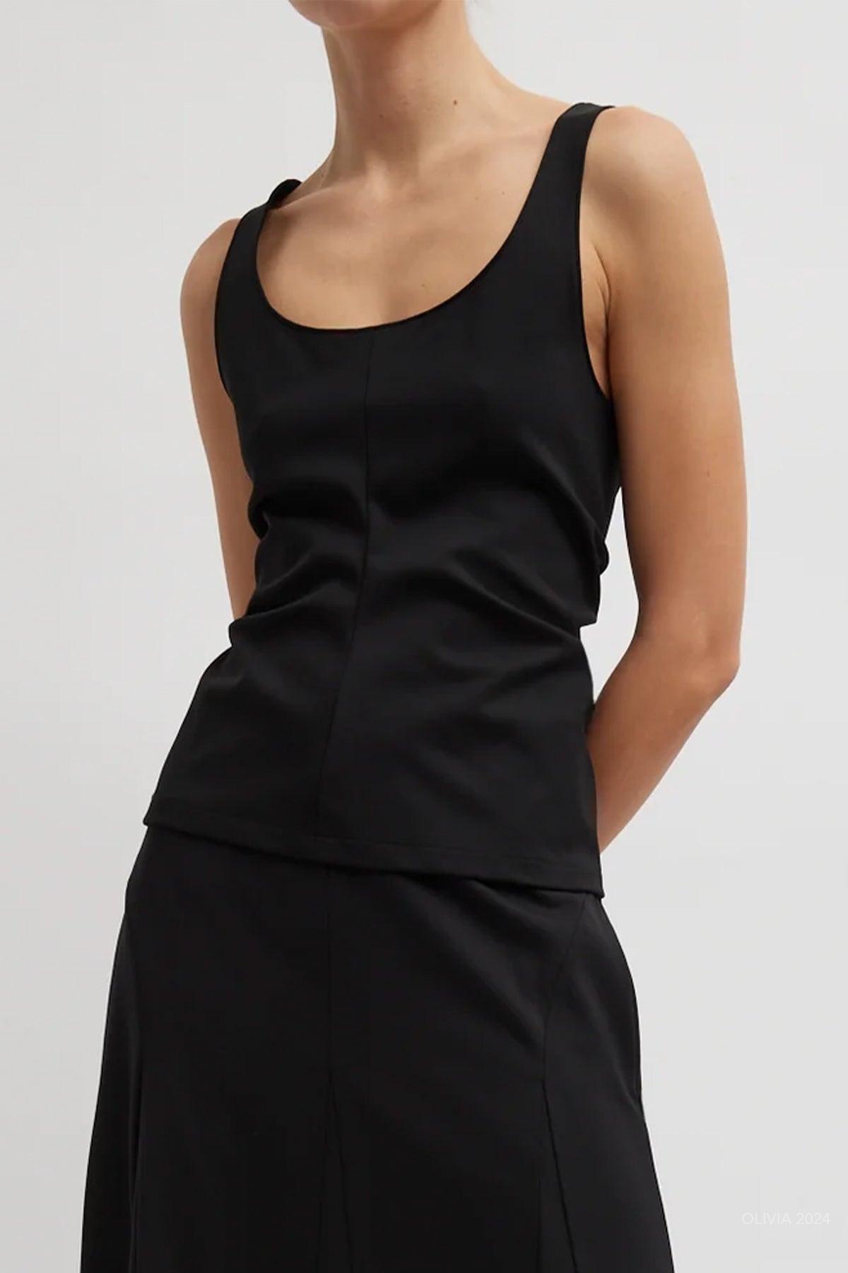 Compact Ultra Stretch Tank in Black - shop - olivia.com