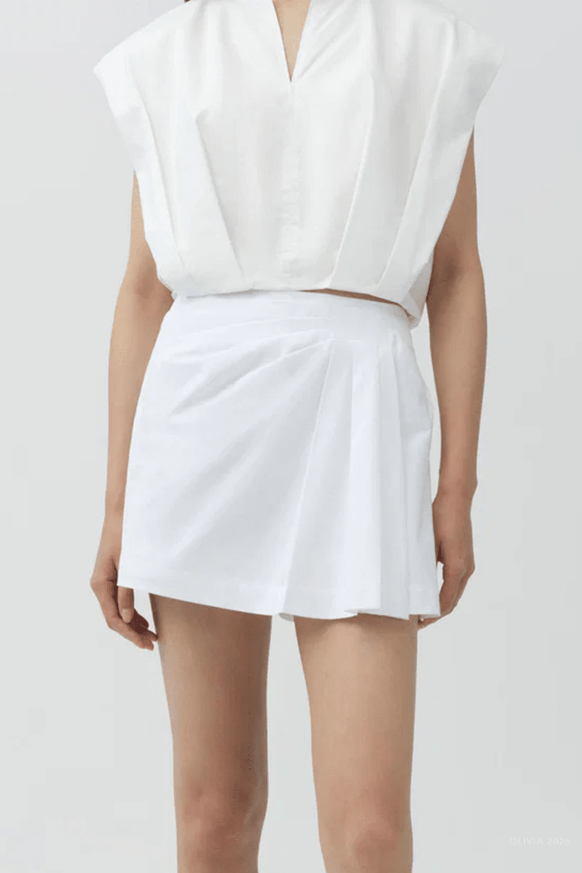 Devlin Pleated Mini Skort in White - shop - olivia.com