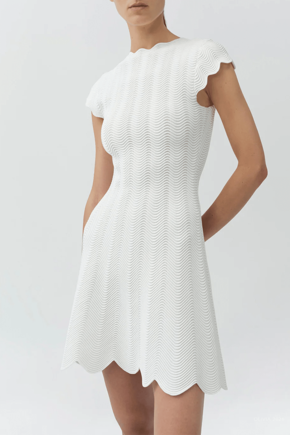 Evalynn Wavy Knit Mini Dress in Ivory - shop-olivia.com