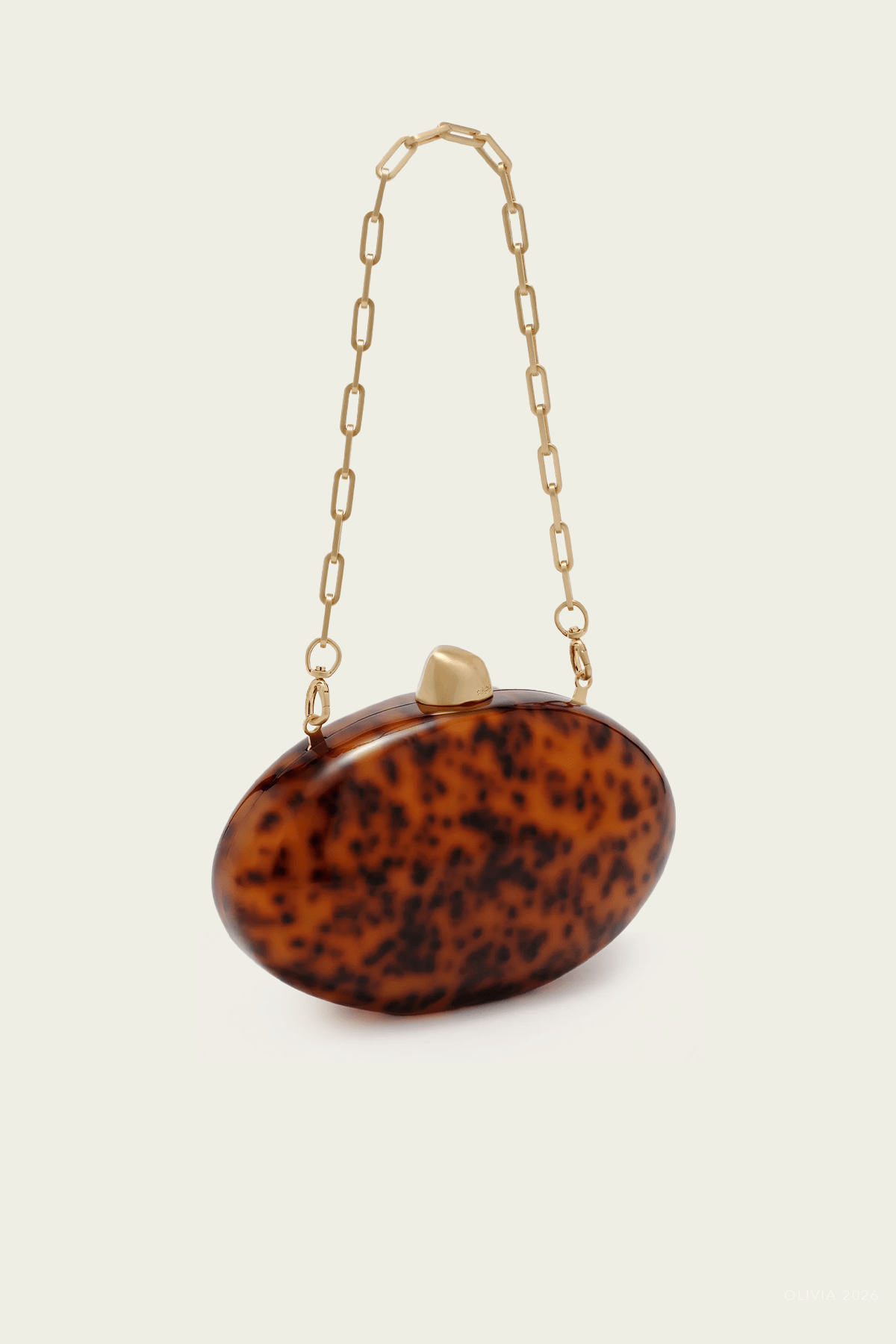 Eviana Clutch in Caramel Tortoise - shop - olivia.com