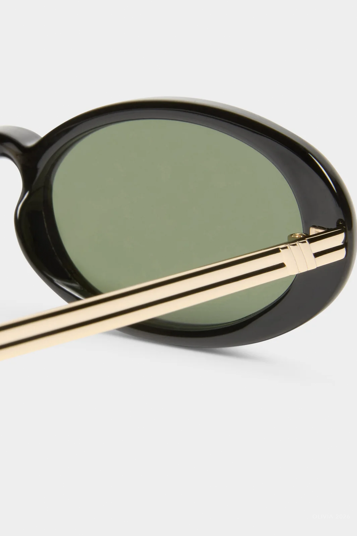 Magnifique Oval Sunglasses in Black