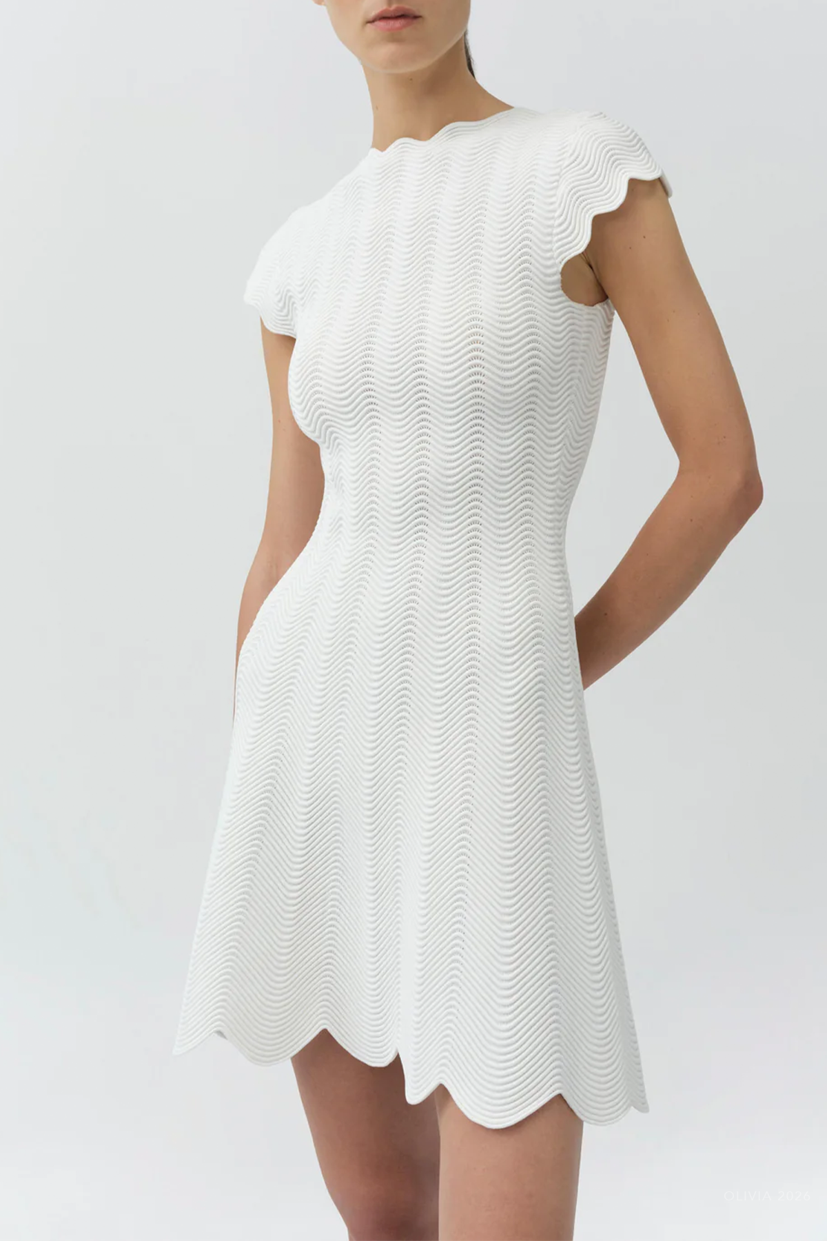 Evalynn Wavy Knit Mini Dress in Ivory