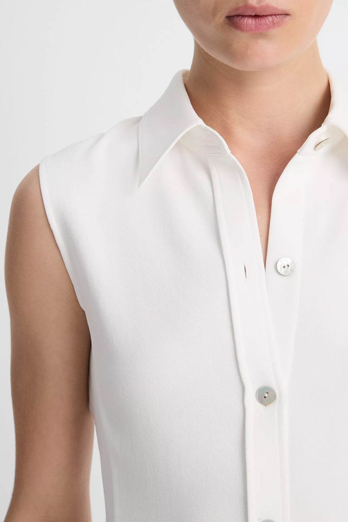 Sleeveless Button - Front Shirt in Off - White - shop - olivia.com